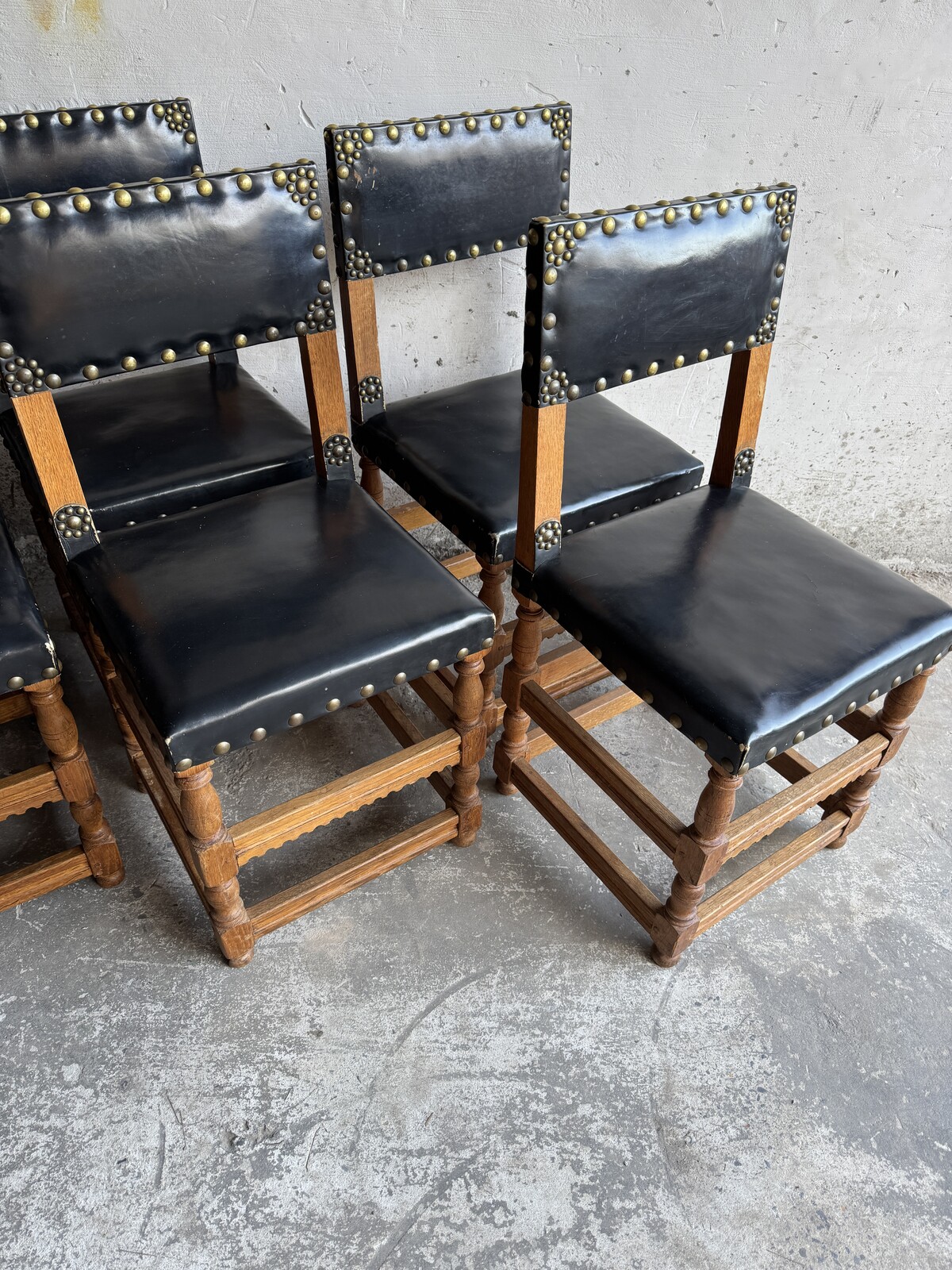 Set of 8 Wooden and leather antique flemish chairs. 