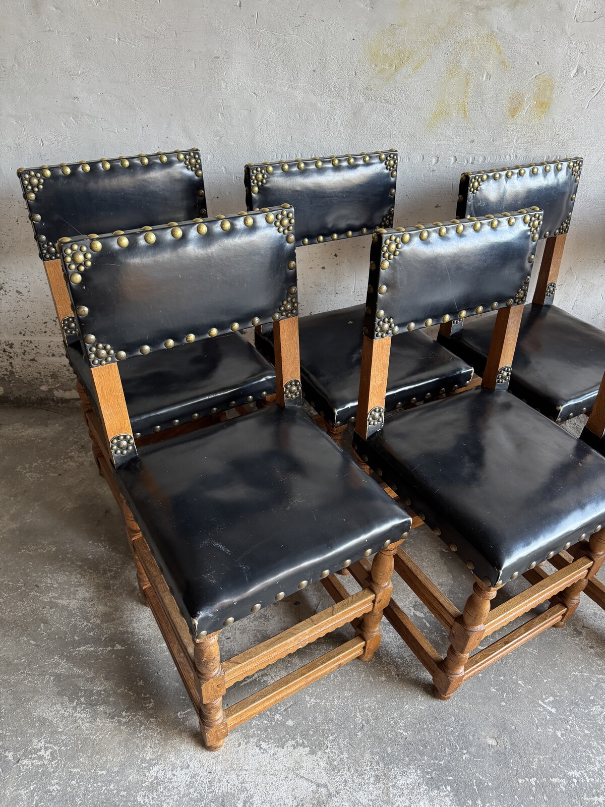 Set of 8 Wooden and leather antique flemish chairs. 