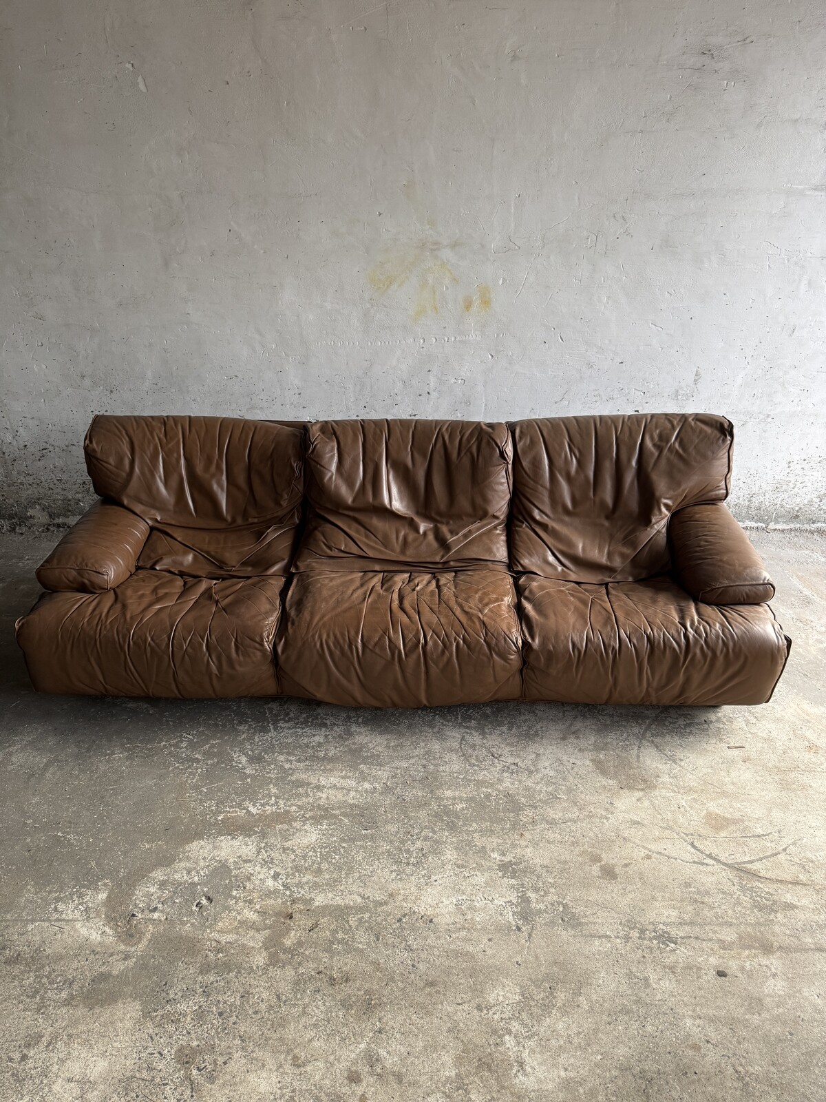 Three seater brown leather Brunati sofa