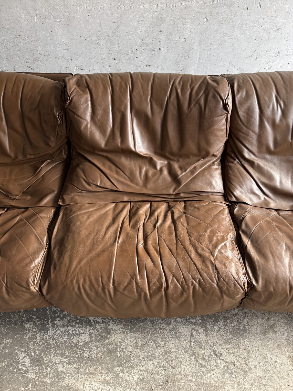 Three seater brown leather Brunati sofa