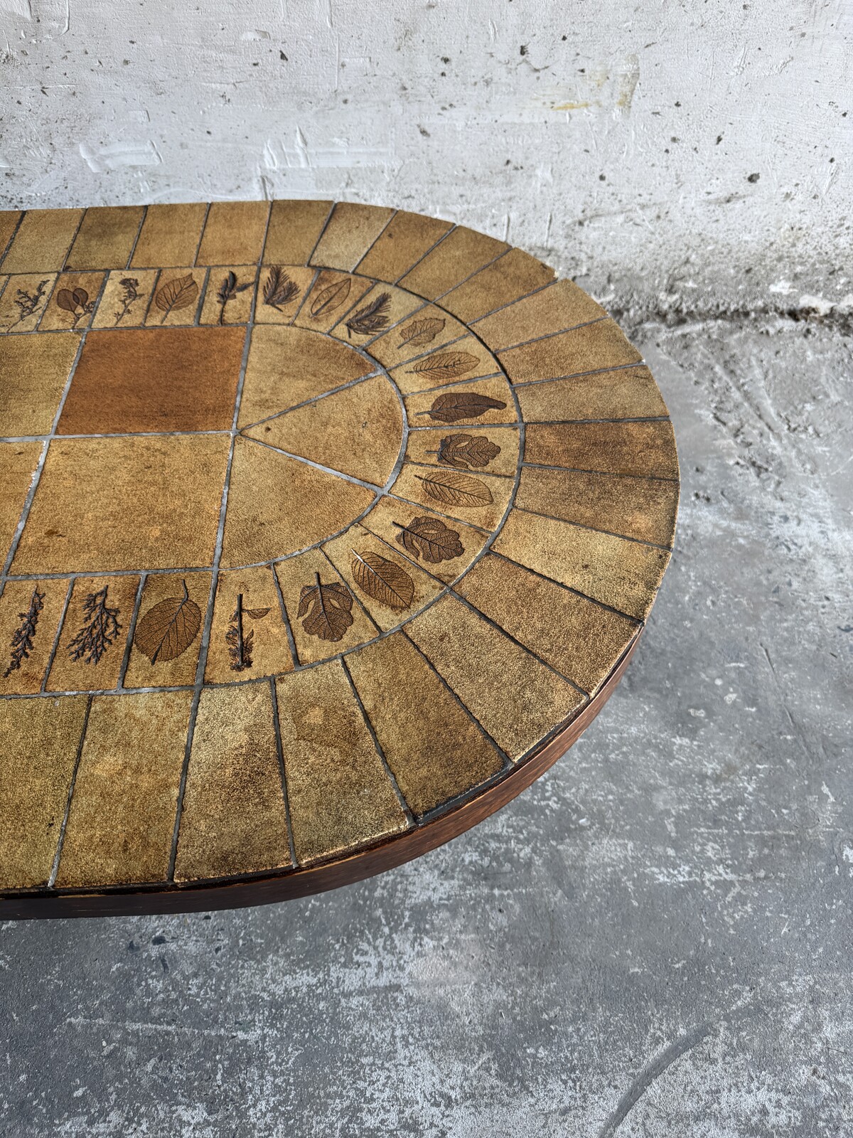 Unique brutalist stone coffee table with leaf design