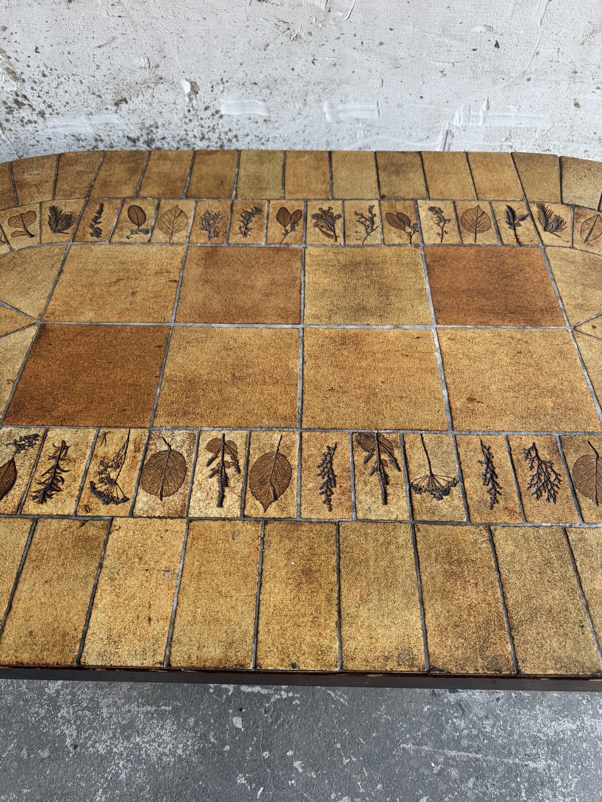 Unique brutalist stone coffee table with leaf design