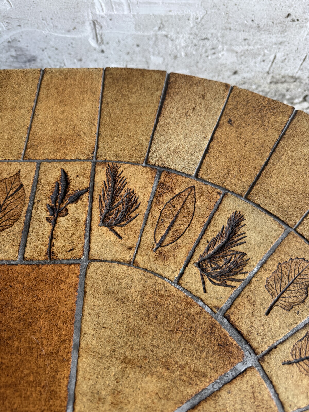 Unique brutalist stone coffee table with leaf design