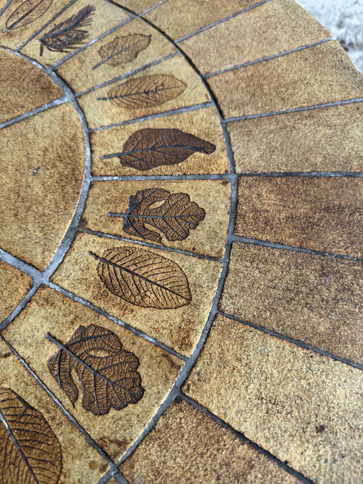 Unique brutalist stone coffee table with leaf design